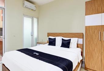 Super OYO Collection O 90253 DHelomi allows 18 year olds to book a room