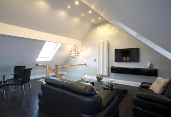 Breck Apartments has rooms with a private hot tub