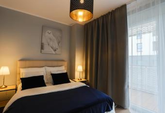 COIN Apartamenty has Balcony rooms