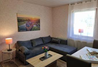 Ferienwohnung-Harz-Abenteuer-fuer-4-Personen-mit-vielen-Spielmoeglichkeiten-im-Innen-und-Aussenbereich-im-attraktiven-Harz has Balcony rooms