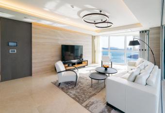 Grand Lct Residence has rooms with a private hot tub