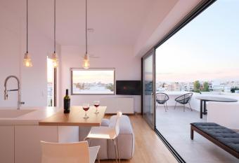 Amazing Suite at Glyfada with sea view & jacuzzi has rooms with a private hot tub