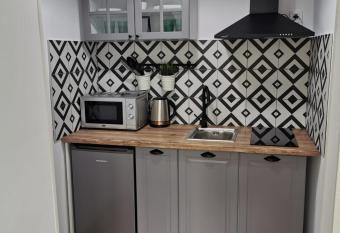 Central Park Studio Petrosani has rooms with a private hot tub