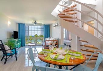 Ultra Modern 2BR Penthouse, Sleeps 5, Beach Front, Pool, Roof Patio, Montego Bay allows 18 year olds to book a room