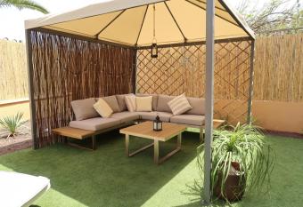 Spacious apartment with large private garden in Palm Mar allows 18 year olds to book a room