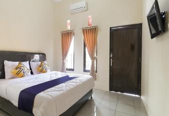 SPOT ON 3859 Sweet Candy 2 allows 18 year olds to book a room