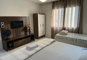 Travessa 12 - Su  tes centro de Serra Negra - SP has Balcony rooms