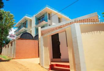 Kitano Tours and Safaris - KILIMANJARO WHITE HOUSE HOTEL - Tanzania Serengeti safari & Mount Kilimanjaro Climbing in Moshi has Balcony rooms