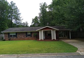 Modern Suburban Ranch has Balcony rooms