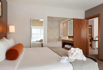 Radisson Hotel and Conference Center Calgary Arpt has rooms with a private hot tub