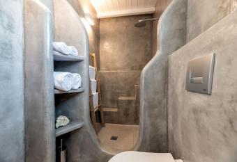 Luxury Paros Villa Villa Votsalo Suite 1 Bedroom with Jacuzzi Naousa has rooms with a private hot tub