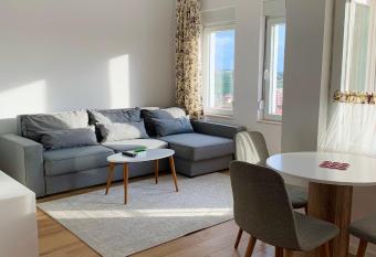 Blini Studio Apartment has rooms with a private hot tub