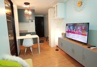 A cozy 1 br Scandinavian inspired condo unit near the beach has Balcony rooms