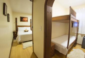 Pousada Green House by Conrado Vitali has rooms with a private hot tub