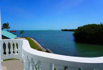 See Belize WATERSIDE Sea View Suite with Infinity Pool & Overwater Deck allows 18 year olds to book a room