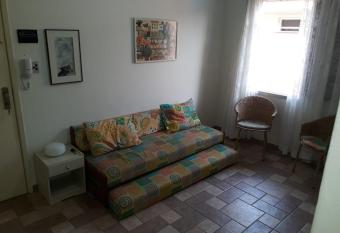 Apartamento na enseada 50 metros da praia has Balcony rooms