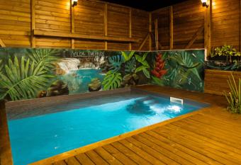 Maison de 3 chambres avec piscine privee jacuzzi et terrasse amenagee a Schoelcher a 2 km de la plage has Balcony rooms