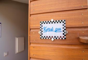 Maison de 2 chambres avec piscine partagee sauna et terrasse amenagee a Sainte Anne a 5 km de la plage has rooms with a private hot tub