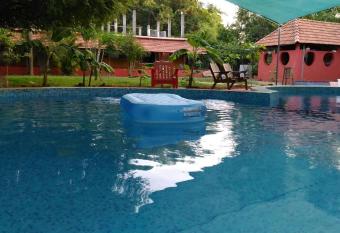 Paradise Vana Vilasa Homestay with Swimming pool has Balcony rooms