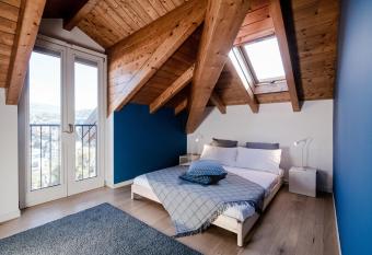 Modern Luxury Attic - byMyHomeInComo allows 18 year olds to book a room