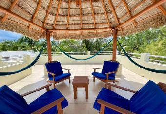 Caribbean Sunrise Cottage has Balcony rooms