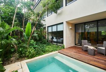 Jungle luxury Tulum condo with private pool has rooms with a private hot tub