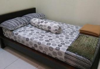 OYO 90170 Griya Palem allows 18 year olds to book a room