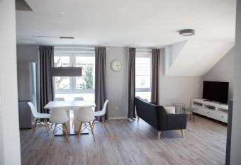 moderne Neubau-Wohnung mit Kamin und 35qm Dachterrasse has Balcony rooms