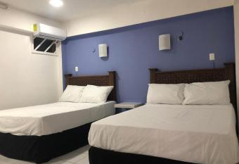 TROPICAL SUITES PROGRESO allows 18 year olds to book a room