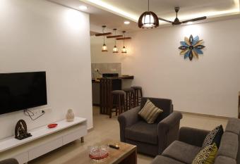 Eerus Den - A Luxurious 2 Bedroom Apartment By Leela Homes has Balcony rooms