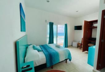 Habitaci  n Amanecer Turquesa #5 allows 18 year olds to book a room