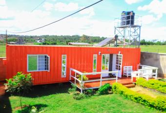 The Red Container-Off Grid has Balcony rooms