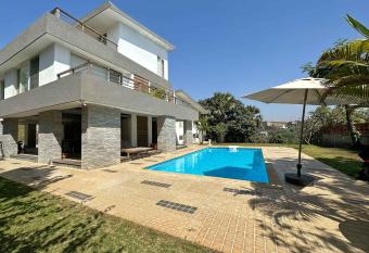 Oceanfront 4 bed private pool Gorai beach villa near Mumbai has Balcony rooms