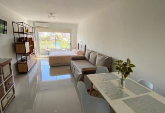 New Dorrego Apart has rooms with a private hot tub