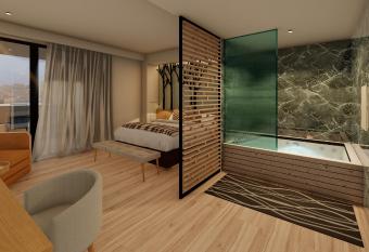 Hyperion City Hotel & Spa has rooms with a private hot tub