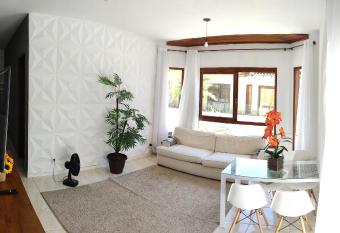 Itaipua  u House - A casa fica    700 metros da praia has Balcony rooms