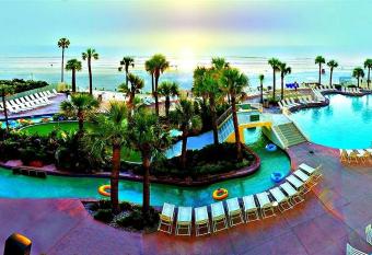 24th Floor 3 BR Resort Condo Direct Oceanfront Wyndham Ocean Walk Resort Daytona Beach 2425 has rooms with a private hot tub