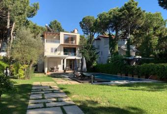 Beachfront Villa with Private Pool by Monika Experiences has Balcony rooms