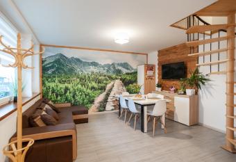 Domek JuKa has rooms with a private hot tub