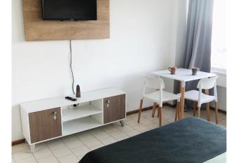 BAM Depto STUDIO CENTRO DE LA CIUDAD VISTA LAGO allows 18 year olds to book a room