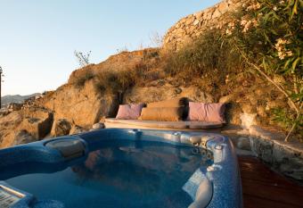 Xydakis Apartments has rooms with a private hot tub