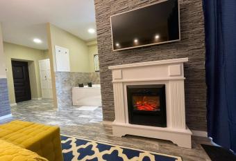 Romantic Jacuzzi Chic Apartment has rooms with a private hot tub