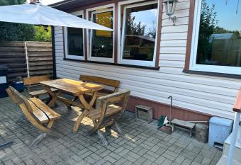 Apartamentai su pirtimi has Balcony rooms