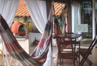 Pousada e Pizzaria Su  tes Saco do c  u has Balcony rooms