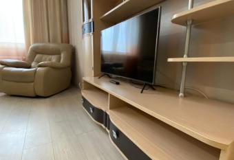 Apartment on KPI has rooms with a private hot tub