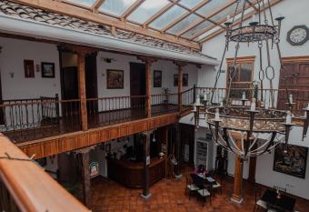 Suites & Hotel El Quijote has Balcony rooms