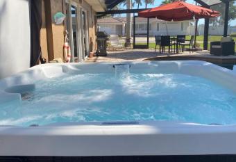 This Homestay Oasis Is The Cape's Best Place To Stay has rooms with a private hot tub