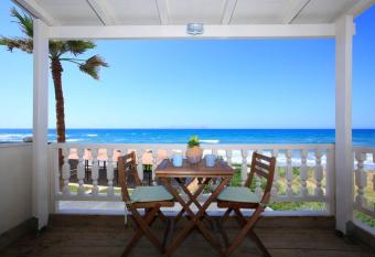 Flokos. Lazy days, balmy nights on the seafront allows 18 year olds to book a room