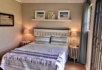 The West Wing guest suite. Pringle Bay. allows 18 year olds to book a room