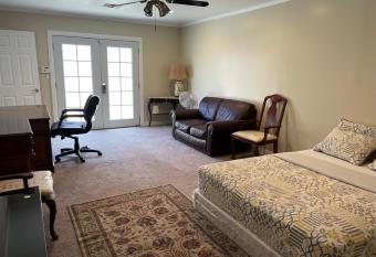 Huge Private Master Bedroom w Full Private Bathroom, Jacuzzi Bath & TV, WIFI & AC & Private Fridge & Private Room Entrance has rooms with a private hot tub